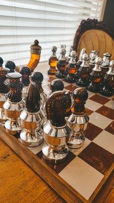 Enjoy a game of chess while you wait.