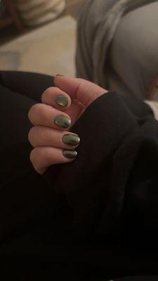Green chrome powder on natural nails