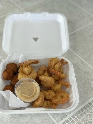 Half a pound Jumbo fried shrimp with hush puppies $1099