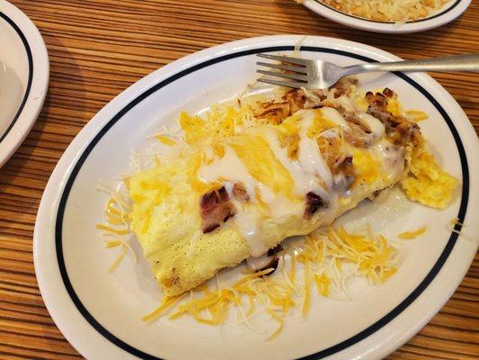 Bacon and Cheese Omelette with white sauce.