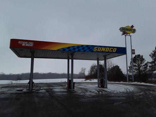 Truck fueling station. The Sunoco sign is visible from the off ramp.