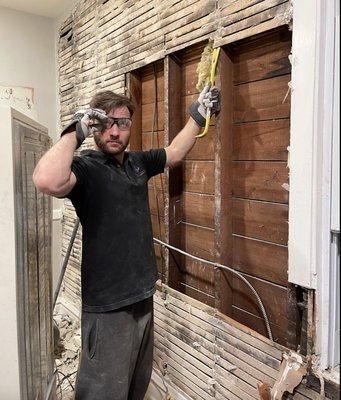 Getting my hands dirty and putting in some work pulling up old lath and plaster