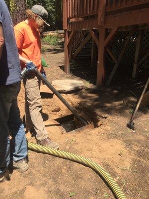 Logan cleaning the tank.