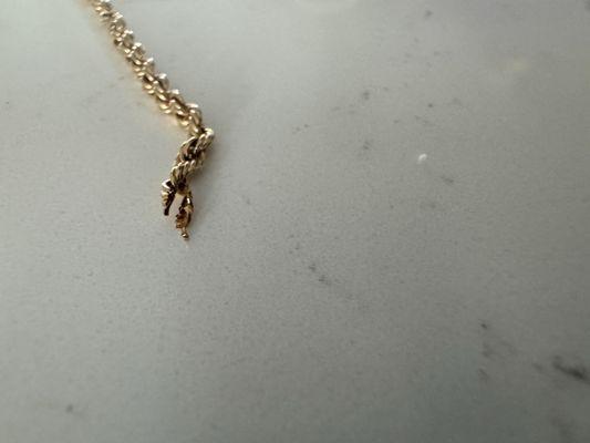 "Solid gold chain" actually hollow