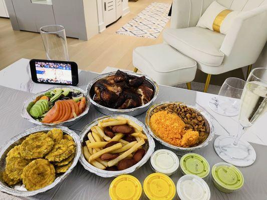 Family Combo Killer: Whole Chicken, rice & beans, Salchipapa, salad, tostones & plenty of sauces. Great deal and so delicious!