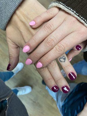 Gel on the bottom w heart design, pink acrylics on top