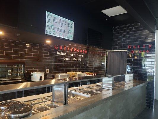 Welcome to Curry House. Indian Fast Food...Indian Fast Food..done Right!
The writing is on the wall.