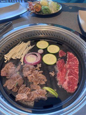 Steak and beef bulgogi and veggies.