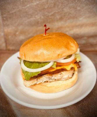 Grilled chick burger on a brioche bun