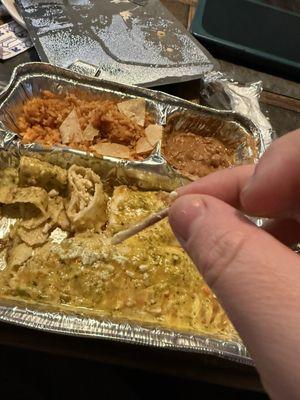 Decent sized bone found in my chicken enchiladas. Mid eating the chicken began to taste sour; almost spoiled.