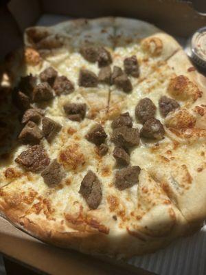 White pizza with meatballs.