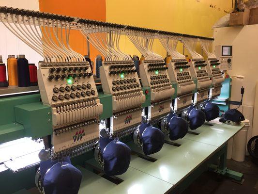 Getting an order done with one of our Japanese Tajima Embroidery Machine.