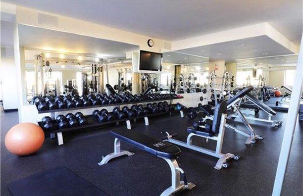 Full gym with free weights up to 90lbs dumbbells, bench press, variety of selectorized machines, etc.