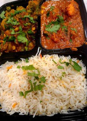 Vegetable curry left & Tikka masala right; veggie had nice variety & textures! Tikka more savory tomato sauce than creamy but still good!