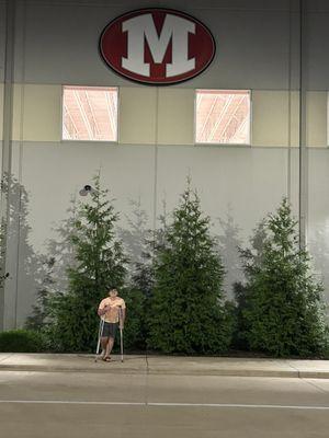 Me on crutches infront of school