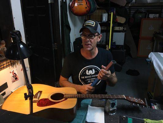 Master Luthier, Davis doing a fret dress