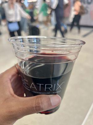 My large plastic cup of to-go wine