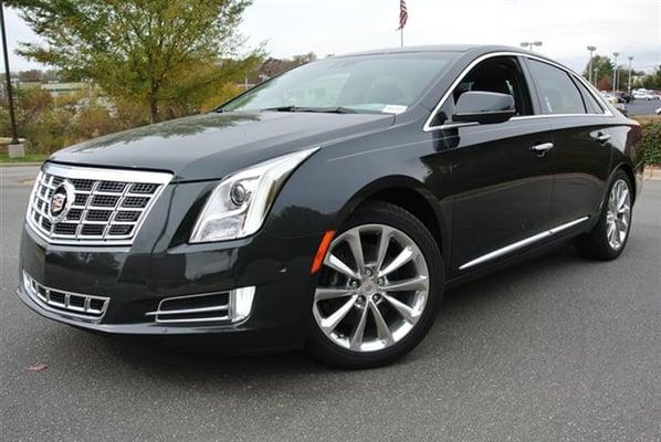 Call us and Request Luxury Cadillac XTS sedan for O'hare/ Midway drop off and pick up with complimentary bottled water and WiFi