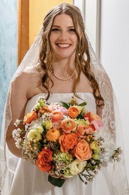 Gorgeous bouquet pinned together with wrapped leaves and pearls