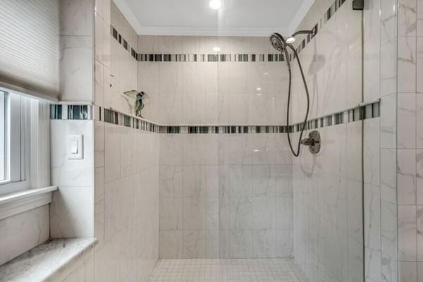 new install of frameless shower door and panel