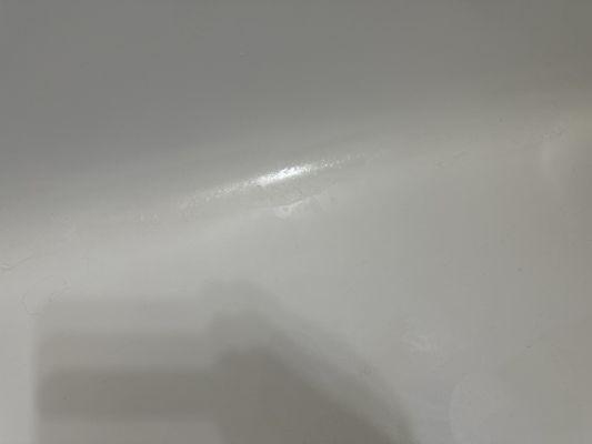 A big drip all the way across the tub from front to back