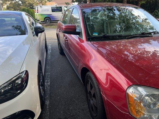 The red car is the Inn employee car that hit my Mercedes Benz. The police deemed her at fault.