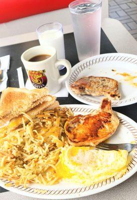 Two pork chop breakfast. Eggs O/M double hash brown scattered white toast and coffee. Good looking yummers today