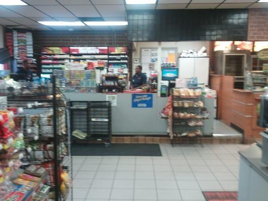 Newly remodeled store with large coffee bar. Subway shop connected to it. Close to the stadium.