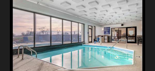 Clean refreshing indoor outdoor pool.