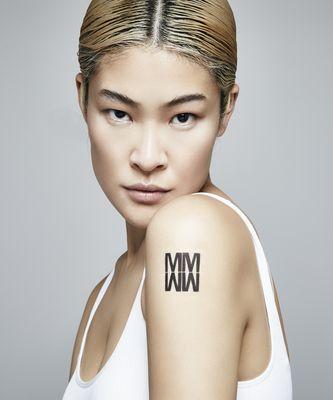 Girl With The MIRA Tattoo.