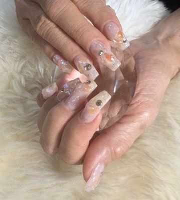 Acrylic fill gel with stone design.