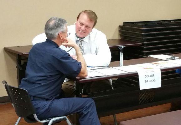 Dr. Hicks is involved with the community, at health fairs like these, for example