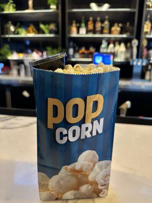 My popcorn and nacho cheese, chef's kiss