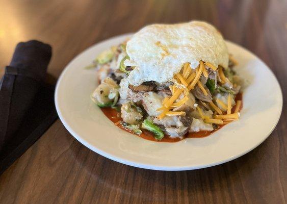 Duck Hash: Duck confit, potatoes, brussel sprouts, mushrooms, red chile, cheese and eggs your way. Oh my.