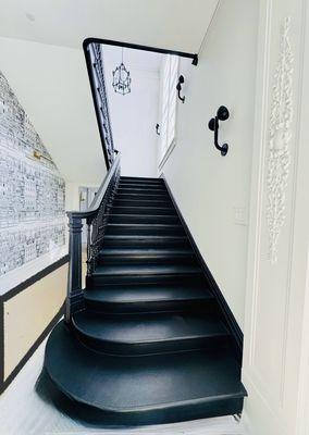 From concept to reality: White Oak staircase in water‑based black paint. In progress, with final details perfected to our standards.
