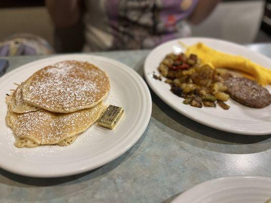 The classic plus- scrambled eggs, sausage, and pancakes selected