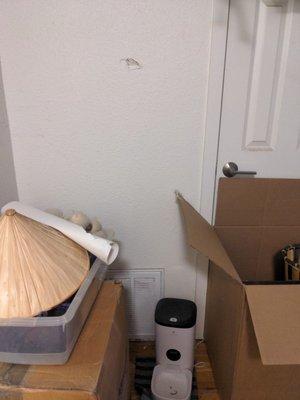 I'm 5'4" and this is at my eye level. Dent from movers.