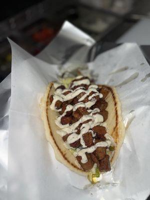 Lamb Gyro w/ white sauce on top