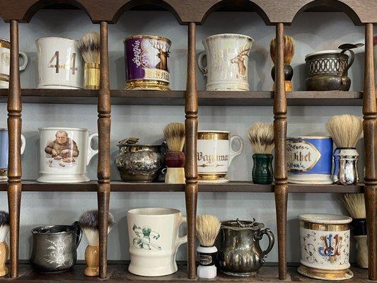Old shaving mugs that are still being used here today. Beyond cool.