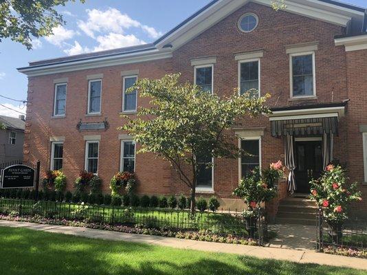 Outside of the River House.