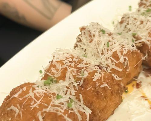 Mmmmm potato and cheese poppers .