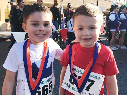 My son and his buddy after they finished the 1k run