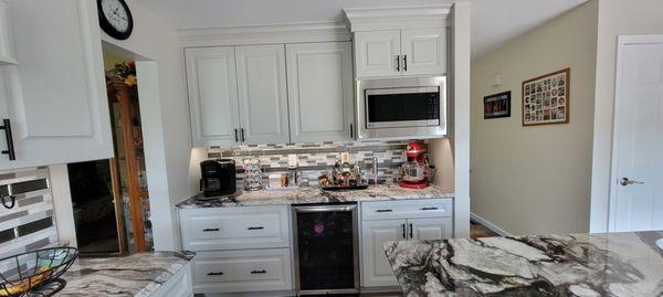 Cabinet microwave, backsplash tiles and wine fridge!