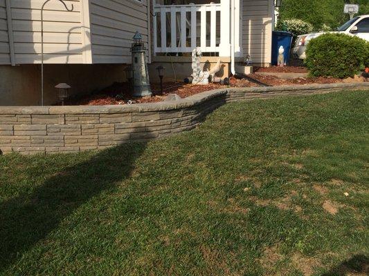 Retaining Wall around flowerbed.