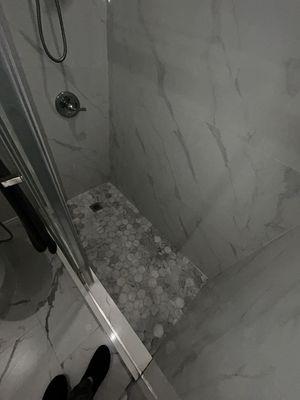 After photo of deep cleaned and scum removal of shower