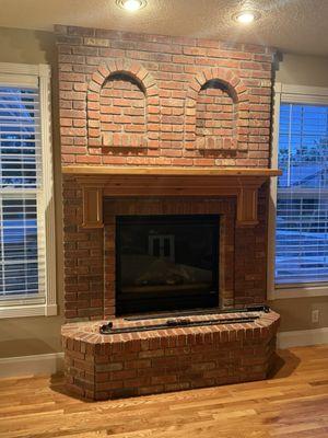 Before white washing brick fireplace