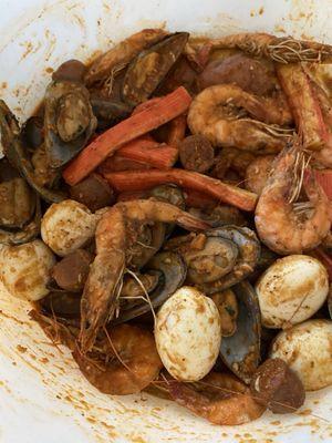 Allsome Sauce in medium with Muscles, shrimp, potatoes and sausage. We added our own eggs and imitation crabs for the kids.