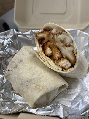 The Basic Wrap
Chicken nuggets, potato bites, American cheese and sauce of choice