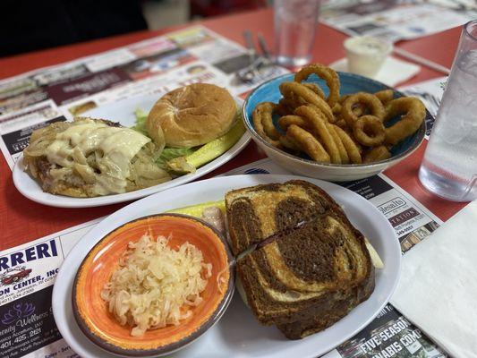 Reuben (sauerkraut on the side), French onion burger, and onion rings