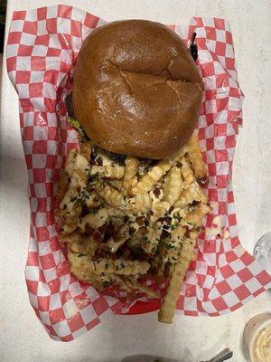 Rattlesnake burger with parmesan fries.